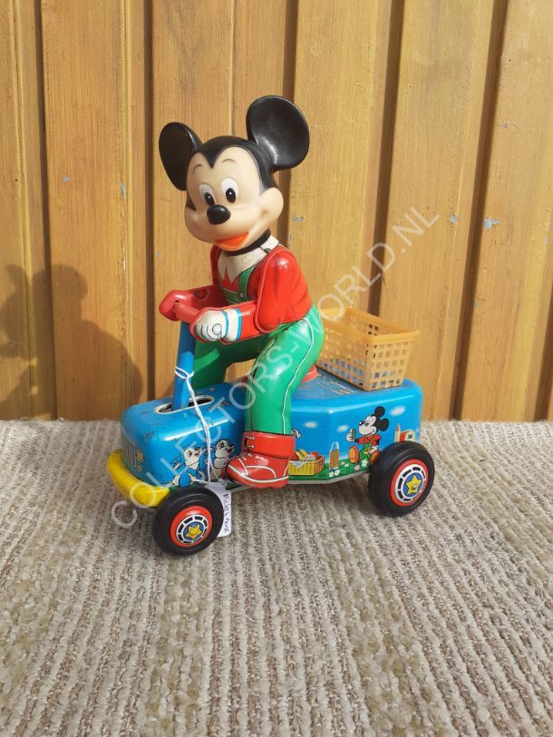 Vintage speelgoedauto Mickey Mouse shopping